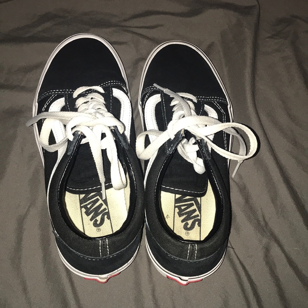 Vans black and white tie shoes size 6.5